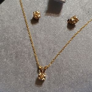 Gold and diamond necklace earring set